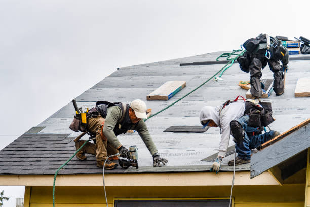 Professional Gutter Installation technician working in Blue River, OR